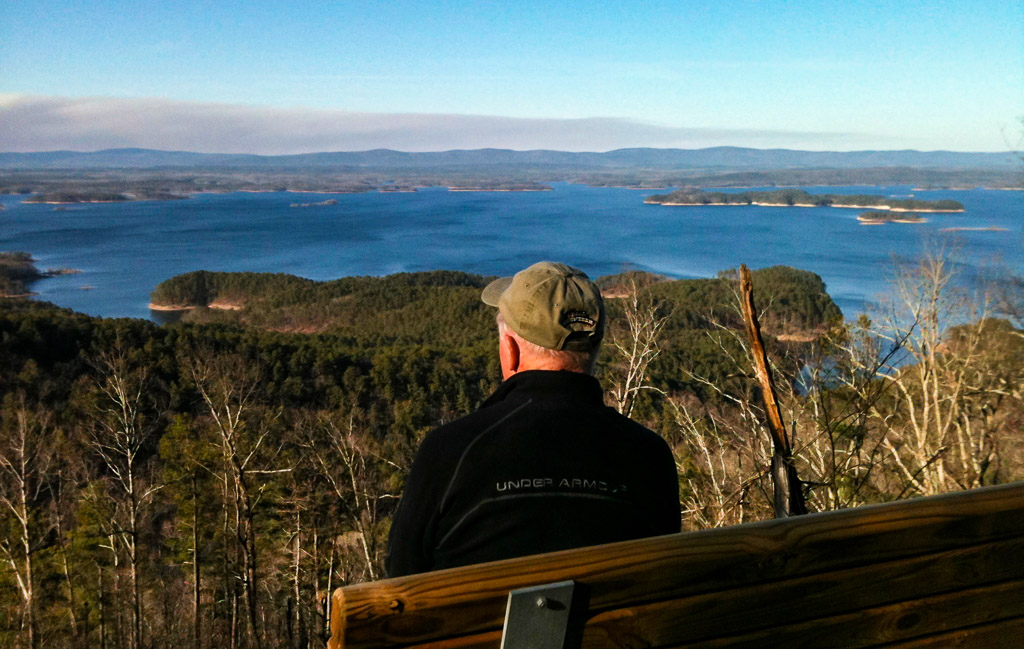Alpha Dog Jerry Shields enjoys the view from the "Traildog Vista" bench on Bear Mountain