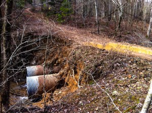 Clogged drainage pipes have resulted in a large washout of old USFS Road 47A.